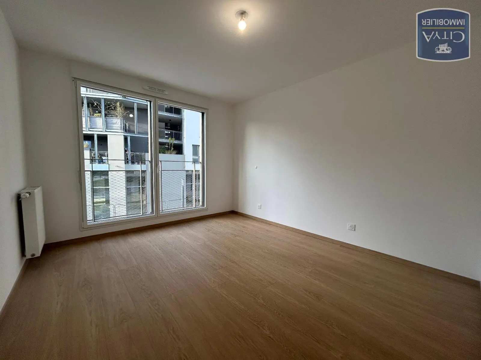 Photo 2 Appartement 3 pièces 70.59m²