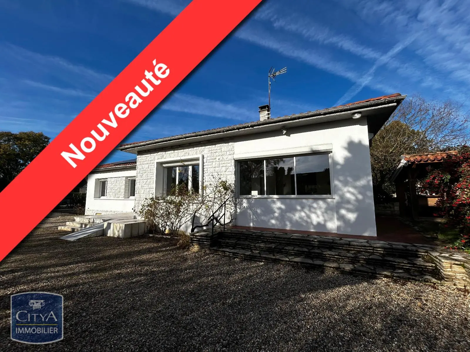 Photo 1 Maison 9 pièces 200m²