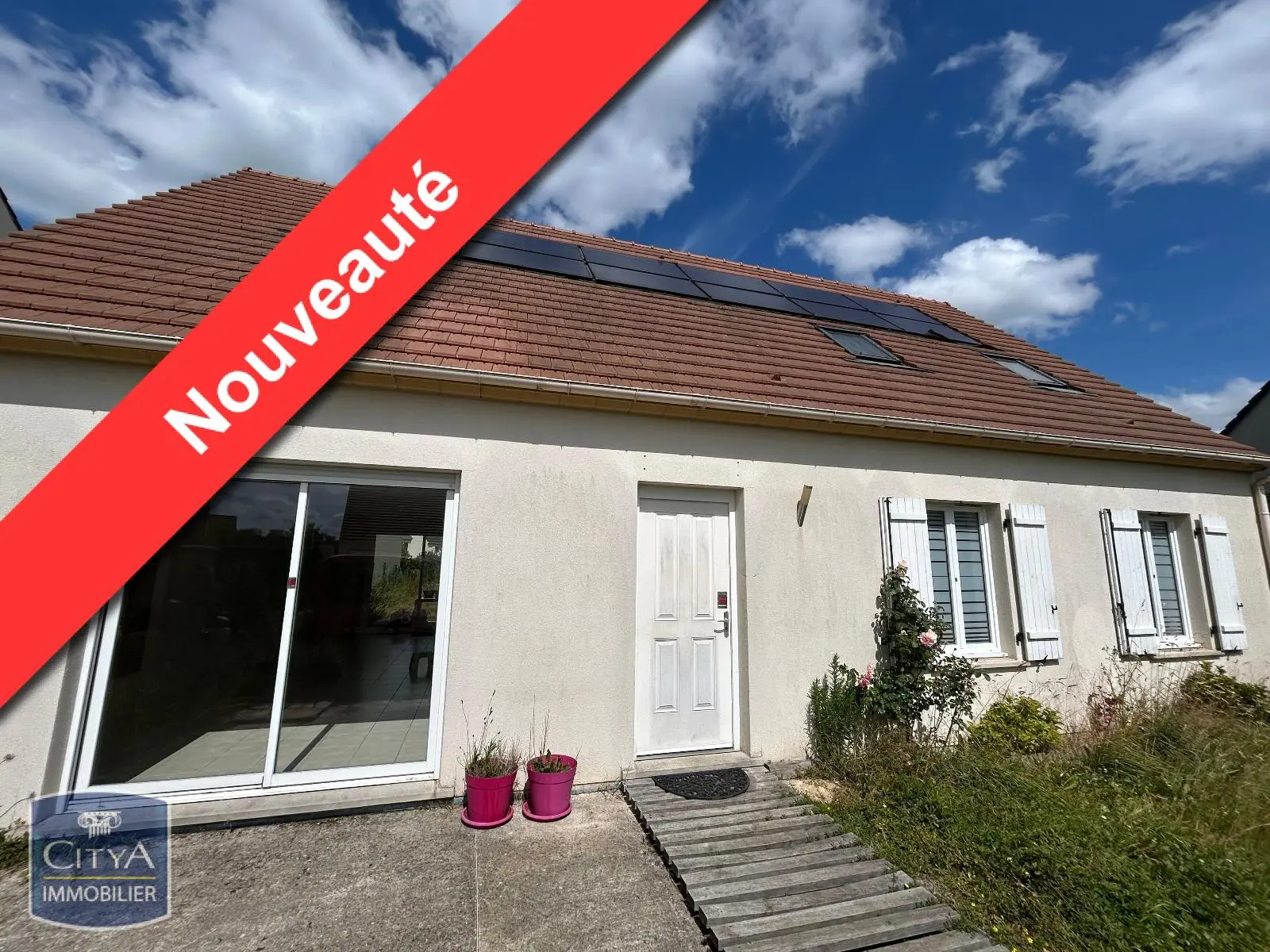 Photo 1 Maison 5 pièces 100m²