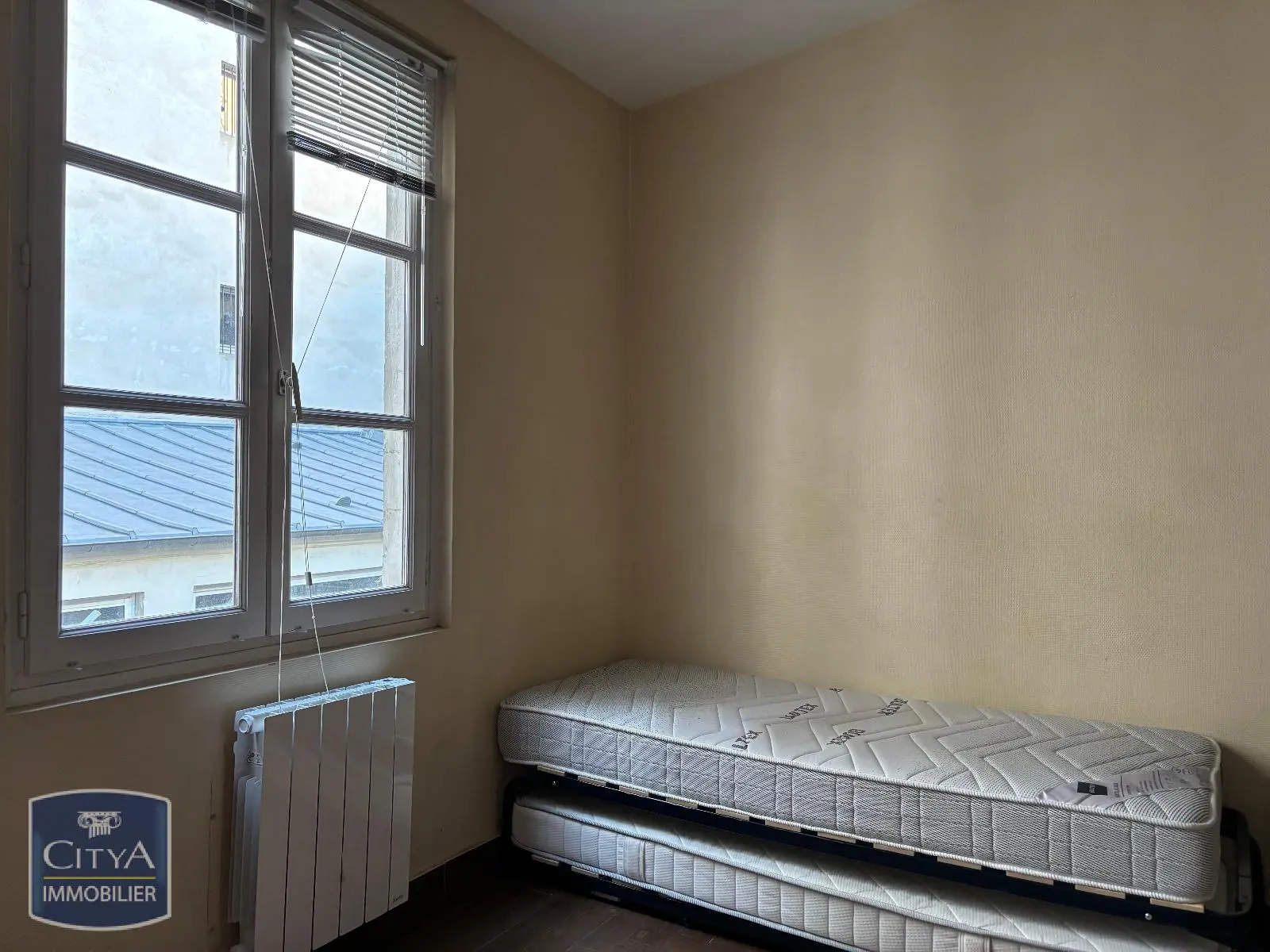 Photo 1 Appartement 1 pièce 14.56m²