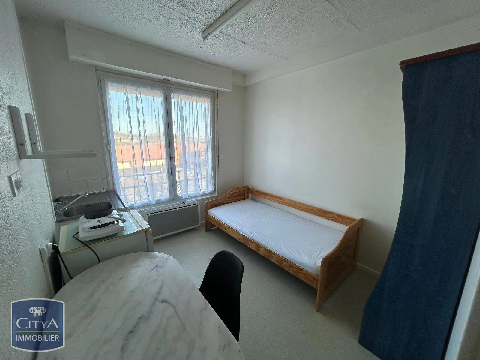 Photo 1 Appartement 1 pièce 12.14m²