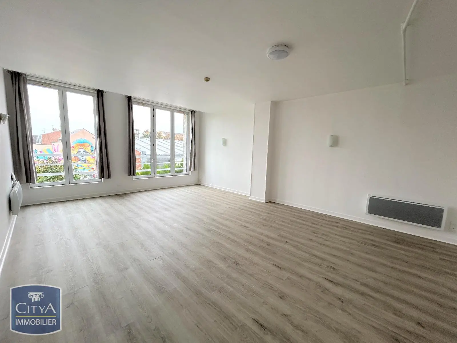 Photo 1 Appartement 1 pièce 60.94m²