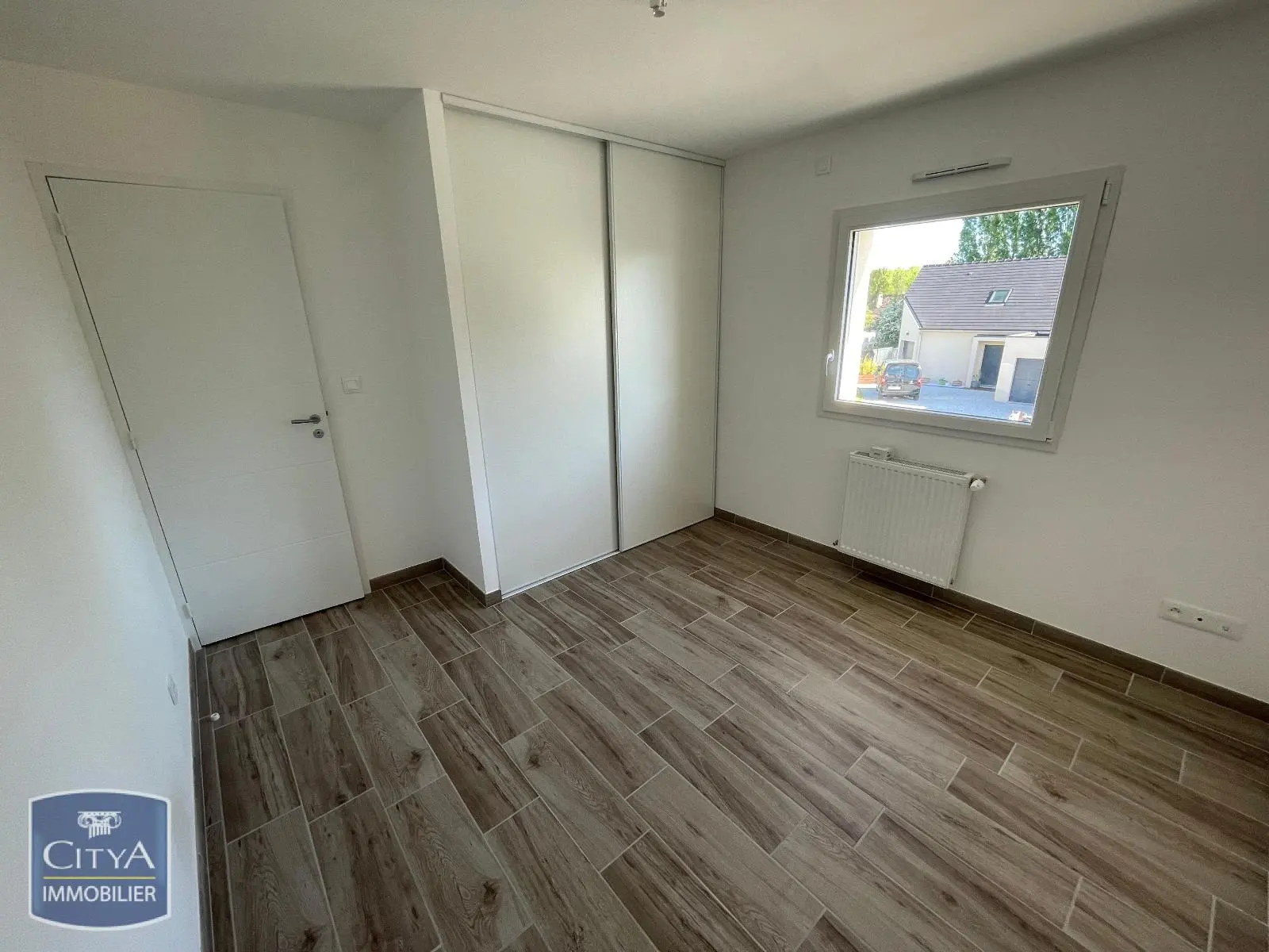 Photo 10 Maison 6 pièces 100.56m²
