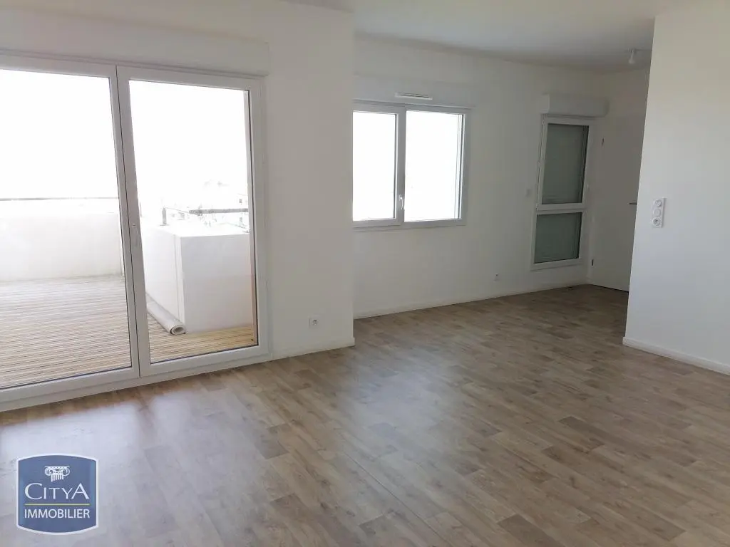 Photo 1 Appartement 3 pièces 62.11m²