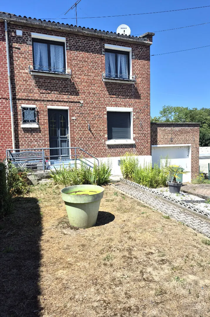 Photo 1 Maison 5 pièces 60m²