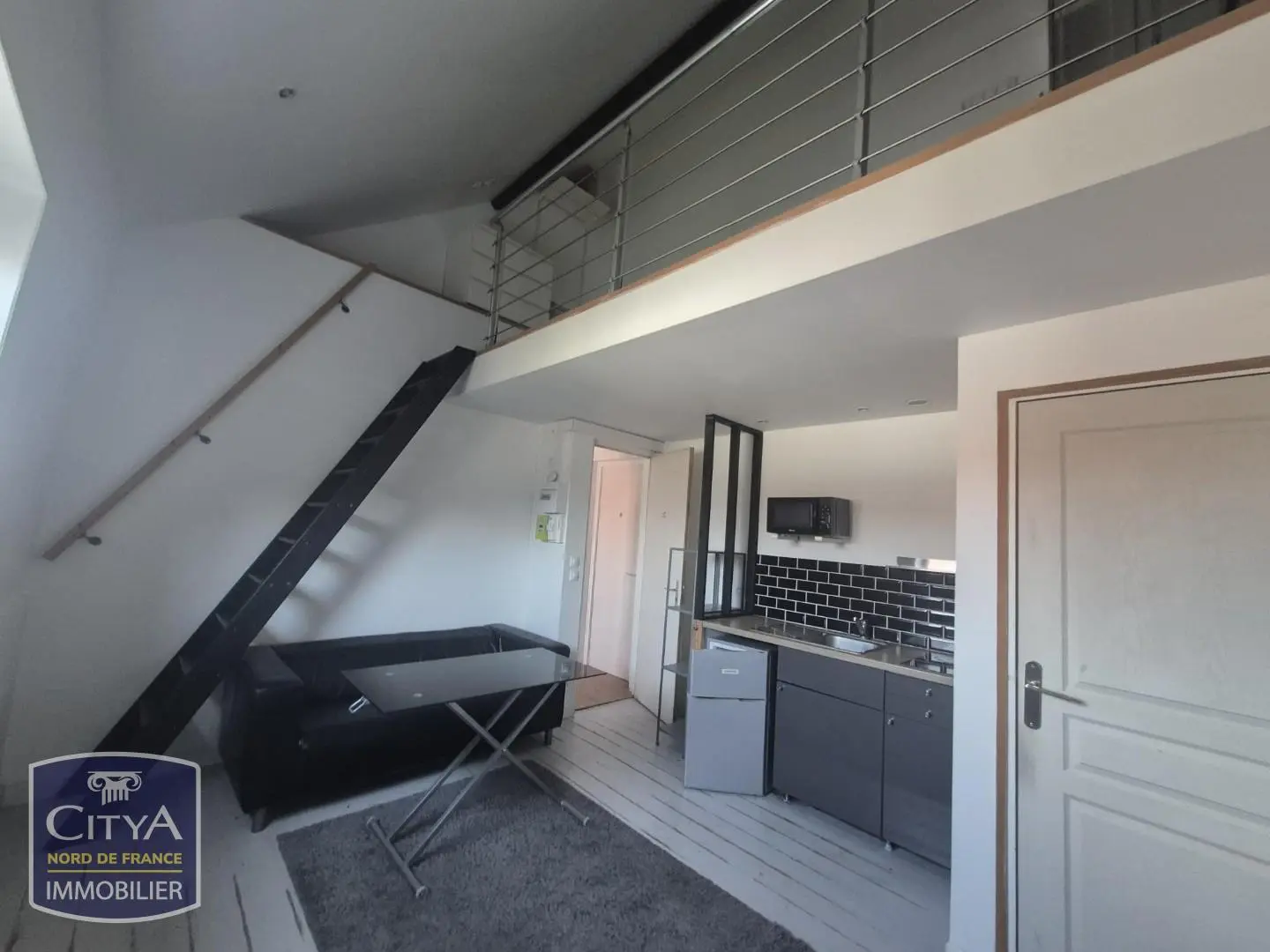 Photo 1 Appartement 1 pièce 21.58m²